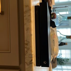 Xbox one x, has been used, in really good condition